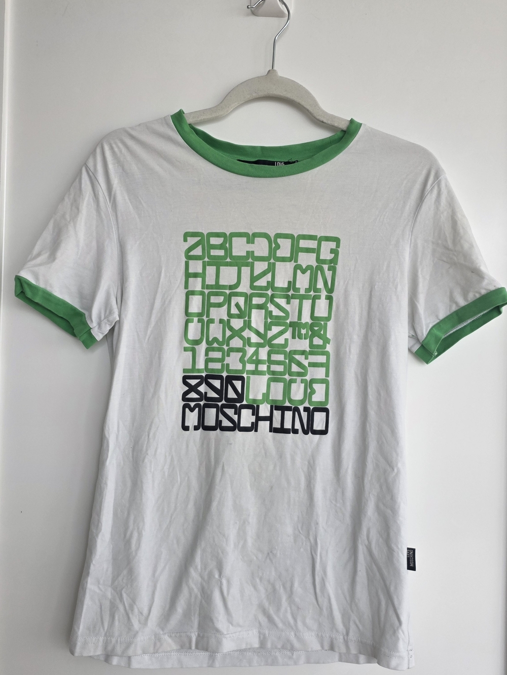 Moschino White Tee with Green Trim and Green/Black Graphic Alphabet